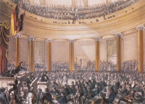 Imatge sobre la sessió parlarmentària de la Constitució de Francfort (1848), un dels precedents de la Constitució austríaca de 1849. Font: Viquipèdia